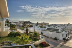 a view from the balcony of a house at Blaauwberg House in Bloubergstrand