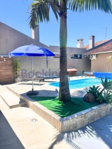 Πισίνα στο ή κοντά στο Recanto da Palmeira - Piscina aquecida, quartos com ar condicionado