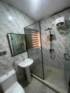 Kopalnica v nastanitvi Fantasy Suite - 2 Bed