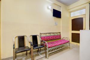 Μια τηλεόραση ή/και κέντρο ψυχαγωγίας στο Hotel O A.N College Patna Formerly Hudco Grand