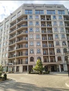 a large white building with a lot of windows at Avinion 2 Апартаменты у моря in Odesa
