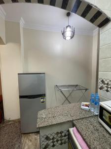 Kuchyň nebo kuchyňský kout v ubytování Luxe Nest Guest House Apartment 101 + 42 fotografií