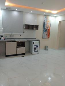 Η κουζίνα ή μικρή κουζίνα στο فندق الضيافة