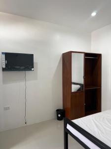 Μια τηλεόραση ή/και κέντρο ψυχαγωγίας στο Harveys apartment