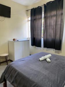 Φωτογραφία από το άλμπουμ του Quarto simples no centro σε Sete Lagoas