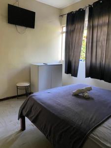 Φωτογραφία από το άλμπουμ του Quarto simples no centro σε Sete Lagoas