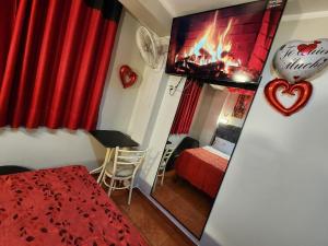 Ένα ή περισσότερα κρεβάτια σε δωμάτιο στο Hostal Paris MYP 2