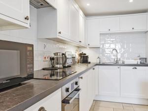 Køkken eller tekøkken på Magdala Garden