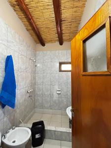 a bathroom with a toilet and a sink at Alojamiento Tati in Purmamarca +20 photos