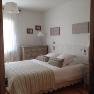Postel nebo postele na pokoji v ubytování B&B La Badelle