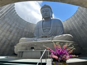 a large statue in front of a building at Nature Moiwa in Sapporo