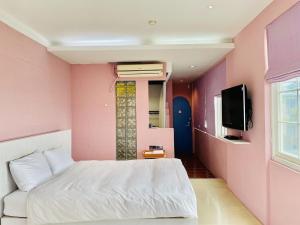 Un televizor și/sau centru de divertisment la Canaan B&B Kenting