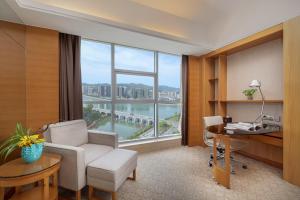 Χώρος καθιστικού στο Zhangjiajie Grand Huatian Hotel at Tianmen Cable Car By the River