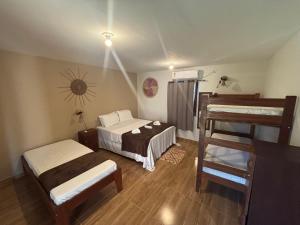 Ένα ή περισσότερα κρεβάτια σε δωμάτιο στο Morada das Dunas