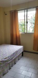 Ένα ή περισσότερα κρεβάτια σε δωμάτιο στο Valley View Residence