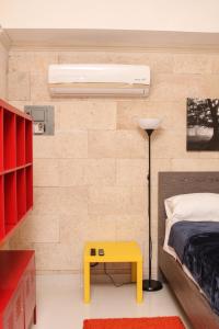 Postel nebo postele na pokoji v ubytování Apartahotel Guaraguao