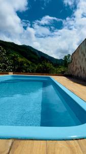 Πισίνα στο ή κοντά στο Chalé das Pedras - Refúgio de Paz em meio à Natureza