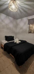 Ένα ή περισσότερα κρεβάτια σε δωμάτιο στο viva la vida