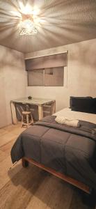 Ένα ή περισσότερα κρεβάτια σε δωμάτιο στο viva la vida