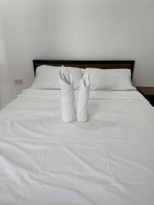 Ένα ή περισσότερα κρεβάτια σε δωμάτιο στο harveys apartment