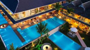 Πισίνα στο ή κοντά στο Three-Colored Cloud River．Rainforest Mist Hidden Resort VILLA (Xishuangbanna Jinghong Mengle Great Buddha Temple Branch)