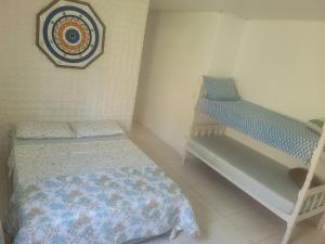 Ένα ή περισσότερα κρεβάτια σε δωμάτιο στο Beach house +3 φωτογραφίες