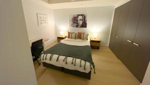 Кровать или кровати в номере Mega Style Apartments Tribeca +6 фотографий