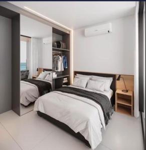 En eller flere senge i et værelse på Studio Alto Padrão- Porto Life 2 - Muro alto + 29 billeder