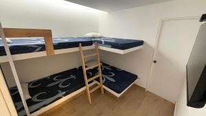 Ένα ή περισσότερα κρεβάτια σε δωμάτιο στο Casa Playa Azul Verano 2026 Asia