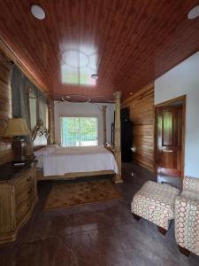 Un pat sau paturi într-o cameră la Casa Langostino