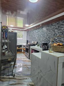 O bucătărie sau chicinetă la Casa Langostino