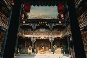 Φωτογραφία από το άλμπουμ του PingyaoSongshengchangHote σε Pingyao