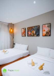 Postel nebo postele na pokoji v ubytování Ipoh Tiga Pool Villa by Papahost + 70 fotografií