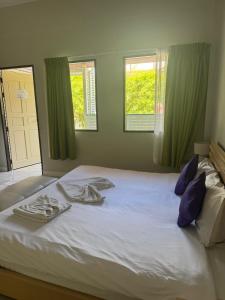 Ένα ή περισσότερα κρεβάτια σε δωμάτιο στο Spice & Sea Resort