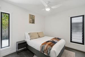 Ένα ή περισσότερα κρεβάτια σε δωμάτιο στο Donovan's Guest House - Foodies, Pet Friendly