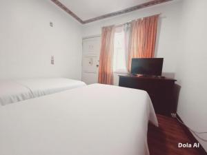 Μια τηλεόραση ή/και κέντρο ψυχαγωγίας στο Estancia Grer By Chat Noir