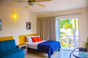 Postel nebo postele na pokoji v ubytování Hotel Majo Sayulita