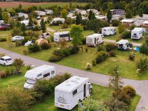 an aerial view of an rv park with parked trucks at Mobil-home de 32m² avec terrasse et équipements de cuisine - API-1-52-1126 in Loudéac
