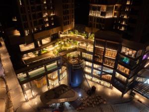 an overhead view of a city at night at Antara Genting by HeyStay Management in Genting Highlands