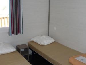 Ένα ή περισσότερα κρεβάτια σε δωμάτιο στο Chalet - Terrasse - API-1-52-1110 +16 φωτογραφίες