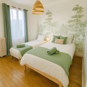 Ένα ή περισσότερα κρεβάτια σε δωμάτιο στο Paris & Disney 20 min