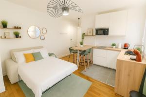 Ένα ή περισσότερα κρεβάτια σε δωμάτιο στο Paris & Disney 20 min