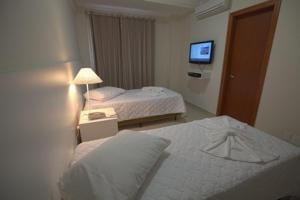Postel nebo postele na pokoji v ubytování Skala Traveling Hotel