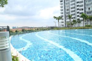 Bazén v ubytování Palm Homestay Dwiputra Putrajaya nebo v jeho okolí + 19 fotografií