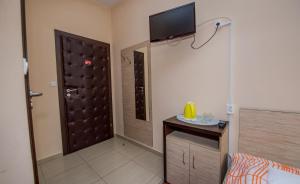 TV a/nebo společenská místnost v ubytování Hotelik Jankowski