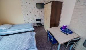 Postel nebo postele na pokoji v ubytování Hotelik Jankowski