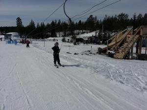 a person on skis in the snow on a ski lift at Bäcka Holiday Home in Orsa