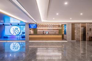 Vstupní hala nebo recepce v ubytování Qingdao Xinduxin Manxin Hotel