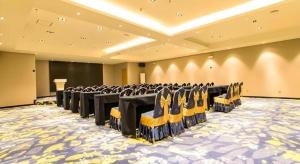 una sala conferenze con file di sedie di City Comfort Inn Nanning Shuangyong Road Guangxi Medical University a Nanning