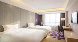 Un pat sau paturi într-o cameră la Lavande Hotels· Suizhou Wenfeng +108 fotografii